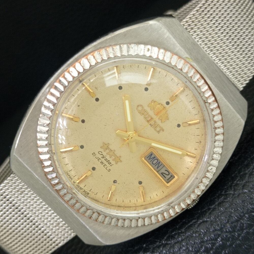 Vintage 1982 Orient Automatic Mens Silver Watch W/daydate & Gold accents